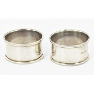 A pair of sterling silver napkin rings, by Prouds. Australian…