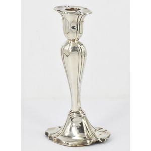 An Edward VII sterling silver candlestick, scalloped rim,…
