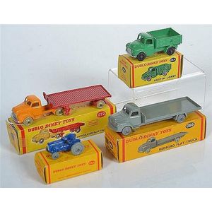Four Dinky Dublos, including 064 Austin lorry with black…