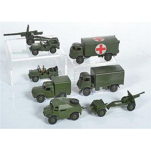 Seven unboxed Dinky military vehicles, including 697 25-pounder…