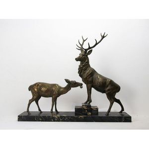 A fine French Art Deco bronze group of two deer signed on the…
