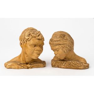 A pair of Australian ceramic busts of young Aboriginals, mid…