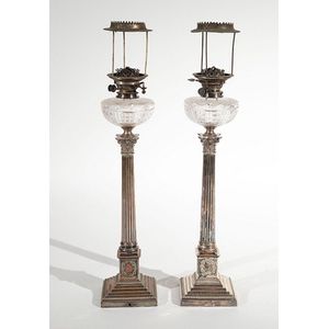 Pair of tall silverplate Corinthian column oil lamps, with cut…
