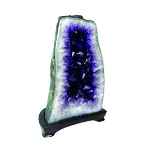 A striking cut and polished amethyst quartz geode, tall…