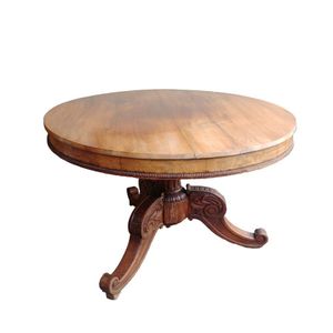 A 19th century French walnut circular drum top dining table,…
