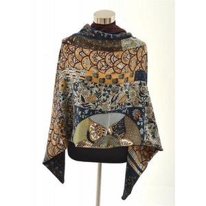 A Cashmere and silk scarf by Hermes, the 'Pique Fleuri de…