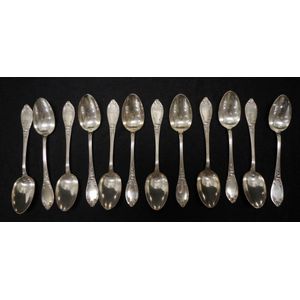Set twelve French silver plate tea spoons each with decorated…