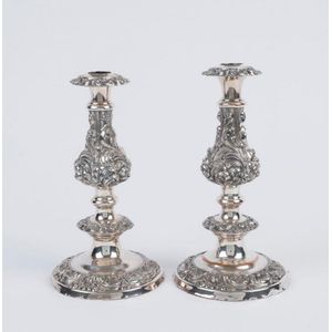 A pair of antique Sheffield Plate candle sticks, 19th century,…