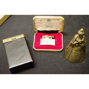 Antique figural brass bell, a Ronson lighter and vintage…