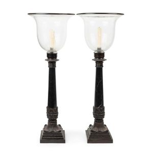 A pair of Geraldine Cooper candle holders, black marble and…