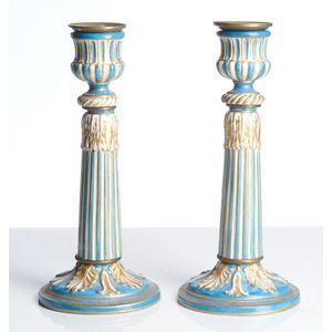 A pair of French porcelain candlesticks, early 19th century,…