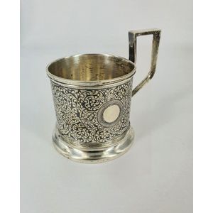 An antique Imperial Russian silver tea glass holder, zolotnik…
