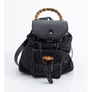 A bamboo backpack by Gucci, styled in black canvas and leather&hellip;