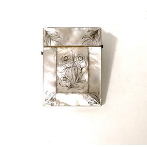 A Victorian engraved mother-of-pearl card case, engraved floral…