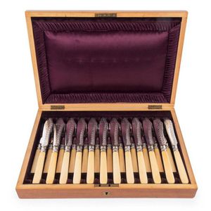 An antique fish cutlery service for twelve, engraved silver…