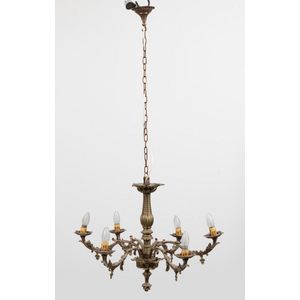 A vintage six arm brass chandelier, with decorative knopped…