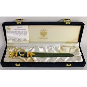 A house of Faberge letter opener, the handle depicting the…