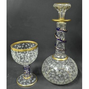 A Victorian glass decanter & matching glass, with frosted…