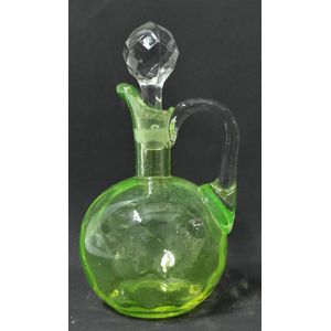 A Uranium green decanter with Thumbprint detail, height 17 cm