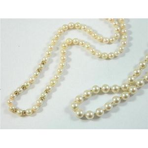 A strand of cultured pearls and gold Rondels with an imitation ...