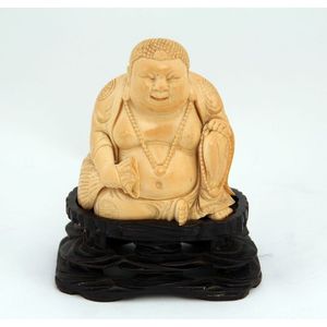 Carved ivory Oriental Buddha - price guide and values