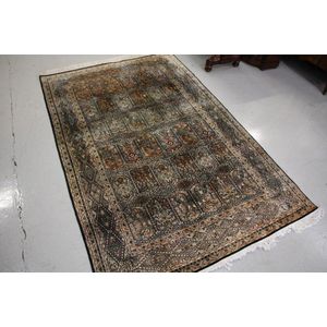 An Indian silk floor rug. 280 x 180 cm.