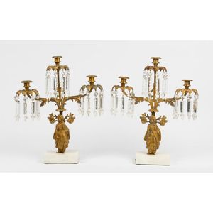 A pair of Louis XV style figural gilt bronze candelabra, each…