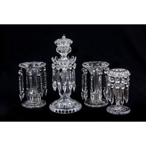 A collection of faceted glass lustre vases, 19th century and…