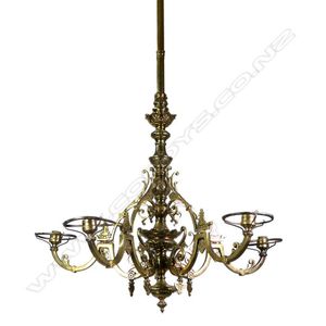 A Victorian brass chandelier, five highly ornate Gothic-style…