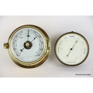 Two aneroid marine Barometers, 20th century, unmarked, a brass…