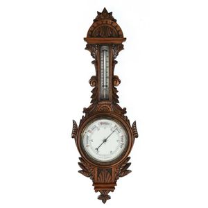 An English aneroid banjo barometer in oak case, 19th century,…