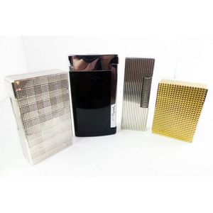 Four lighters classic mid 20th century design. By Dupont and…
