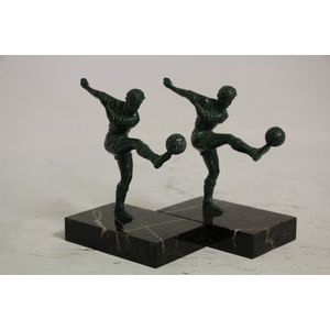 A pair of French spelter bookends on rectangular bases. 14 cm…
