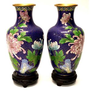 Pair of Japanese cloisonne vases on wooden stands, decorated…