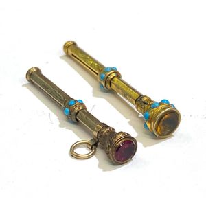 Two miniature gold lined, citrine & glass seal top propelling…