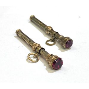 Two miniature gold lined, glass seal top propelling pencils,…