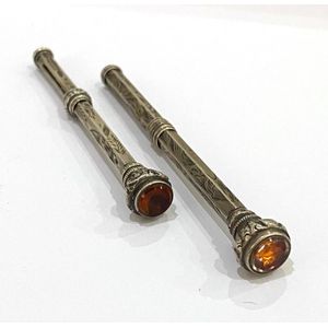 Two sterling silver, citrine & glass seal top propelling…