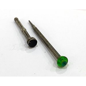 Two sterling silver propelling pencils, one miniature with…