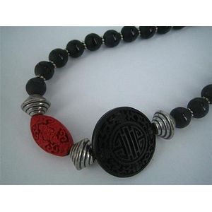 A polished and matt onyx bead necklace with 'cinnabar' spacing…