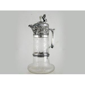 An Elkington plated mounted Claret Jug. Circa 1905. The bombe…