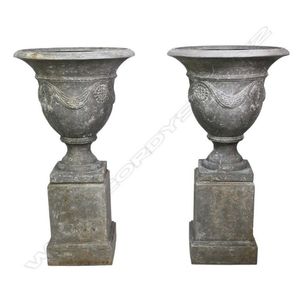 A pair of French style 'Stonecast' garden urns, classical form…