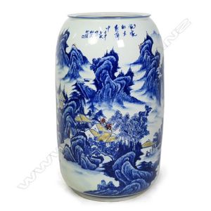 A large Chinese blue and white vase, barrel form, extensive…