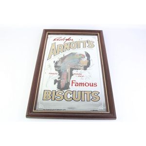 A framed 1930s Arnotts advertising mirror hand coloured and…