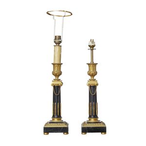 A pair of ormolu mounted black marble table lamps, late 19th…
