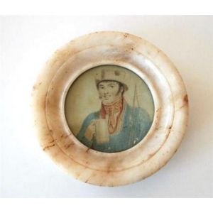 A portrait miniature, of a gentleman in a blue coat and red…