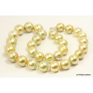 Golden South Sea pearl strand with diamond clasp