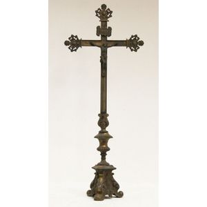 A late 19th century ecclesiastical crucifix on a triform base.…