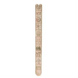 A scrimshaw whalebone busk, engraved and decorated with…