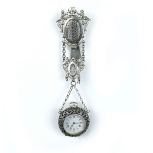 A 19th century silver plate chatelaine pocket watch, the ornate…