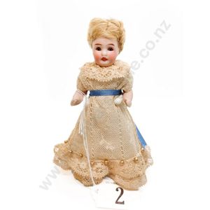 Tiny all bisque doll, stationary dark brown eyes, closed mouth…